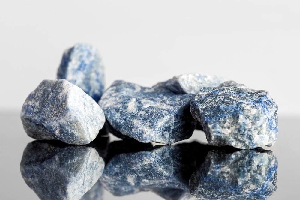 Blue sodalite, uncut, reflections, concept alternative medicine