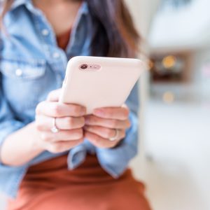 Young Woman use of cellphone and understanding the impacts of technology on mental health