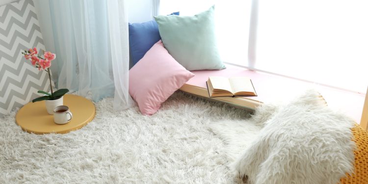A cozy calm corner with soft lighting, fidget rings, healing crystals, and self-care items, creating a peaceful and relaxing home environment.